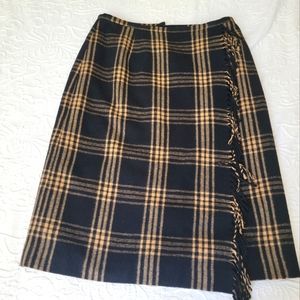 Kaspar, wool, fringe front panel skirt. Size 6. Falls at knee.